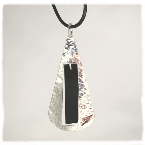 Silver dimpled pendant with Whitby jet